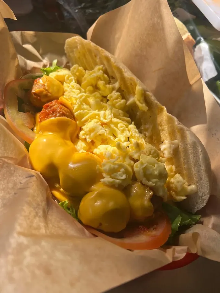 Meatball and cheese panini with egg extra